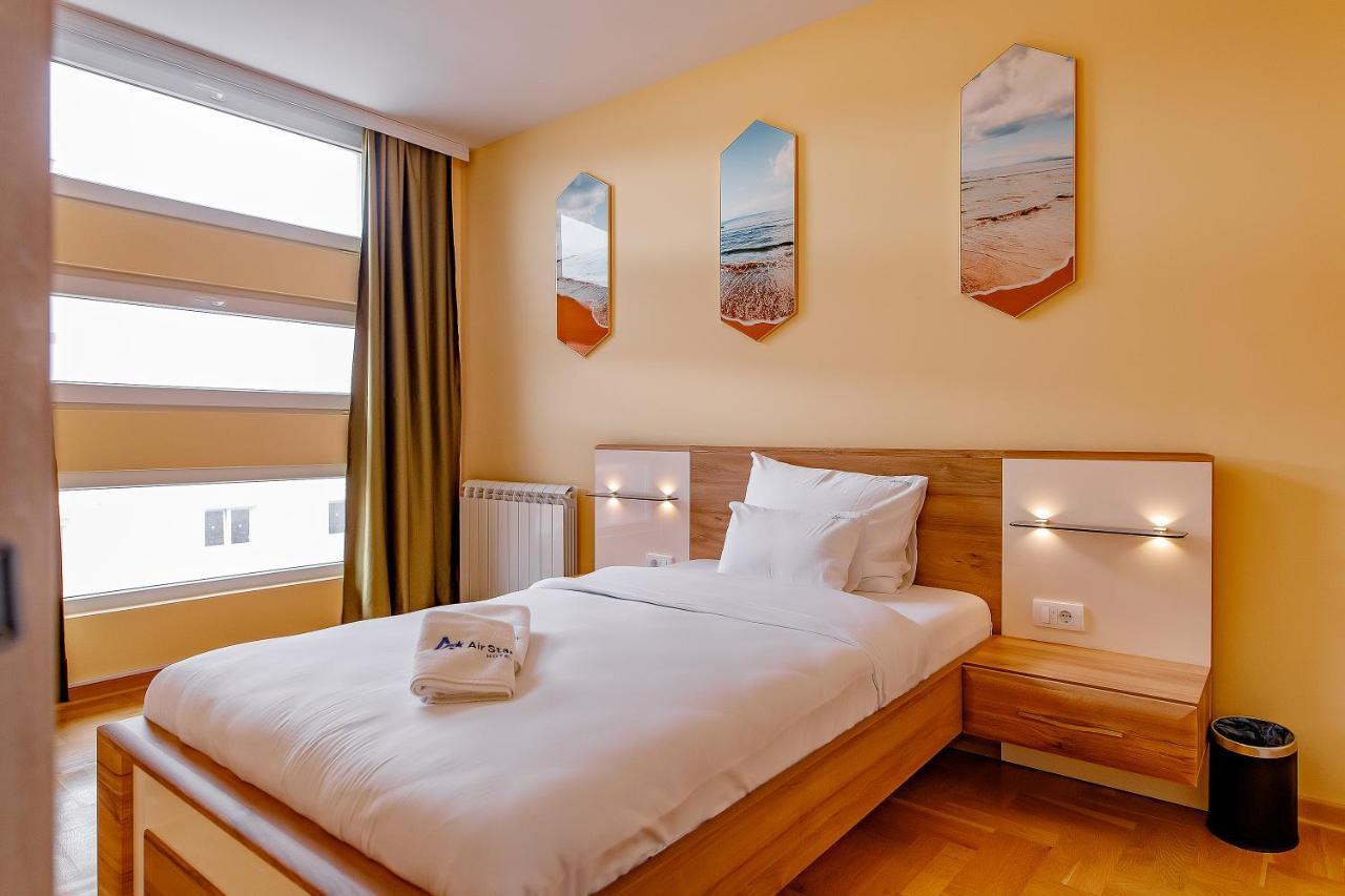 Airstar Hotel Surcin ภายนอก รูปภาพ