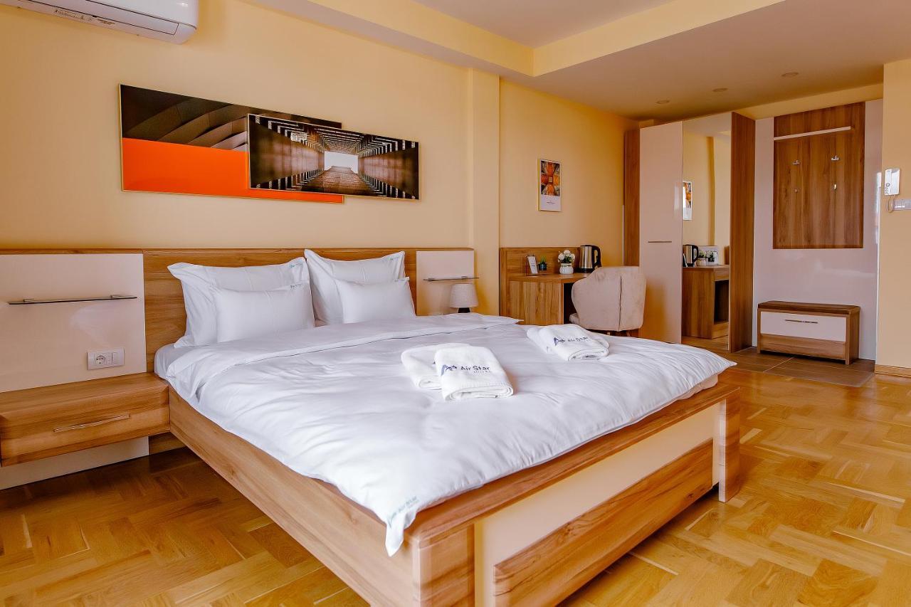 Airstar Hotel Surcin ภายนอก รูปภาพ